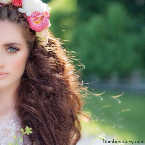 beautiful girl with flowers in hair